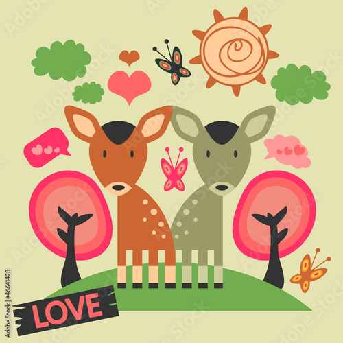 Two cute deers in love on the meadow