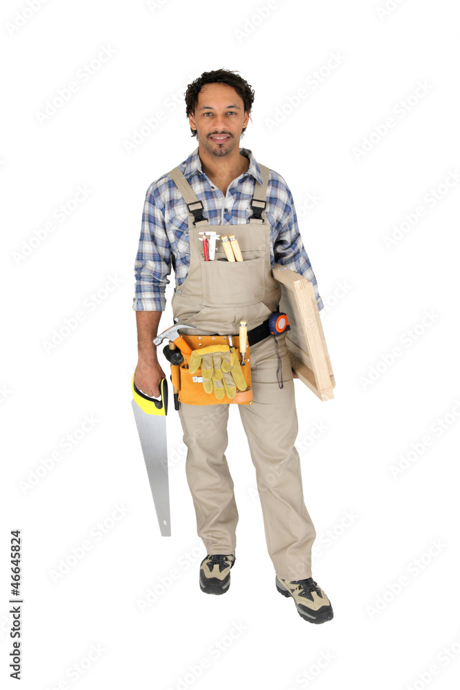 Carpenter holding door and saw Carpenter holding door and saw