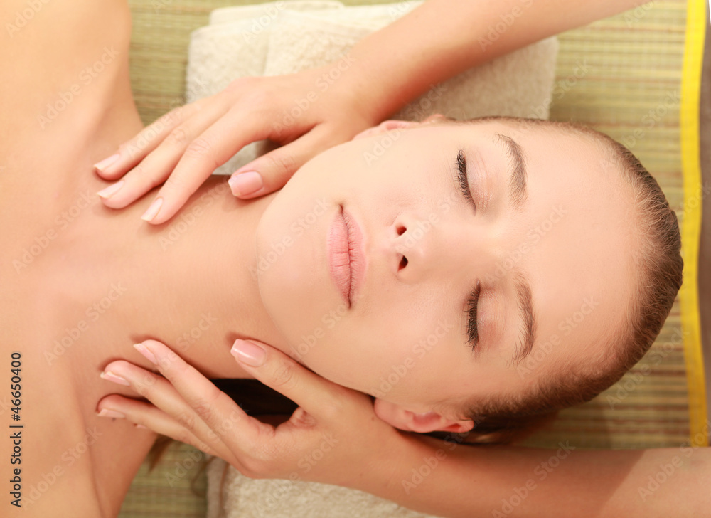 Naklejka premium An attractive woman getting spa treatment