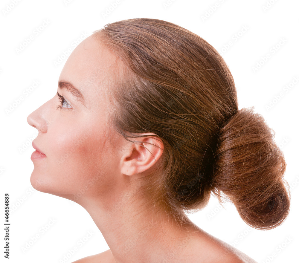 Naklejka premium Young woman face on white