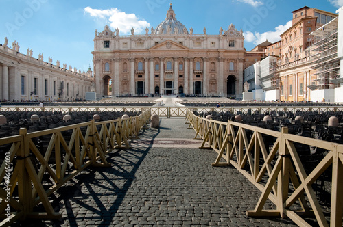 St Peters Basilica fachade and path with wooden fence photo