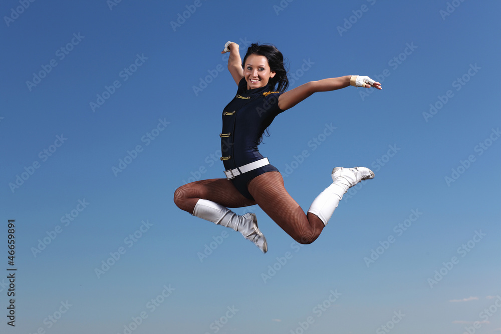 Young female dancer against white background Young female dancer against white background