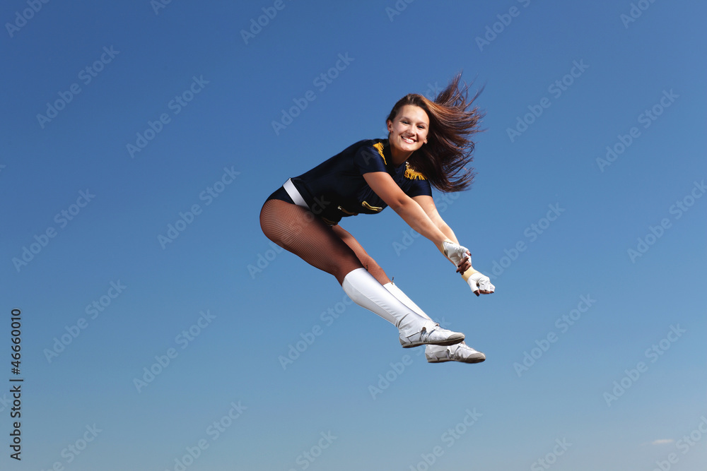 Young female dancer against white background Young female dancer against white background