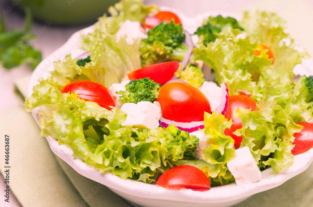 salad with tomatoes, broccoli, red onion and feta cheese salad with tomatoes, broccoli, red onion and feta cheese