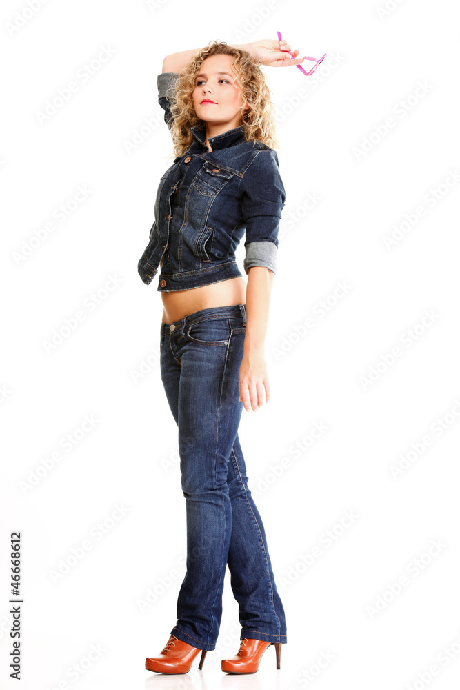 Beautiful young woman blonde standing full body in jeans isolate Beautiful young woman blonde standing full body in jeans isolate