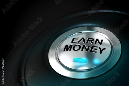 earn money text written onto a metal button © Olivier Le Moal