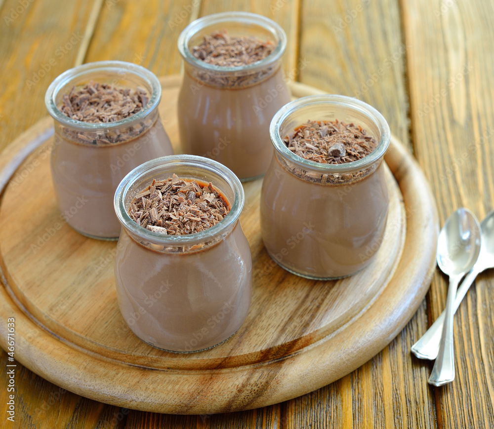 Chocolate Panna Cotta on a brown table Chocolate Panna Cotta on a brown table