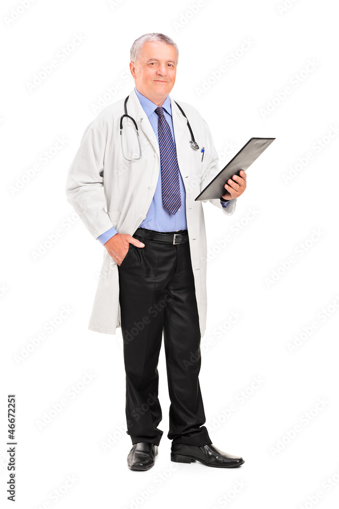 Full length portrait of a mature doctor holding a clipboard Full length portrait of a mature doctor holding a clipboard