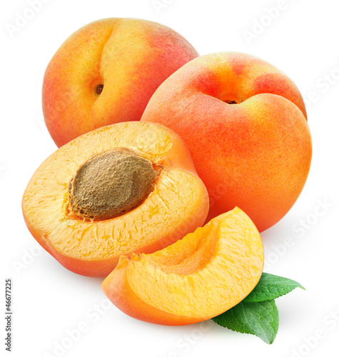 Isolated apricots. Cut fresh apricot fruits isolated on white background