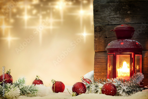 Christmas baubles with lantern and stars background concept photo