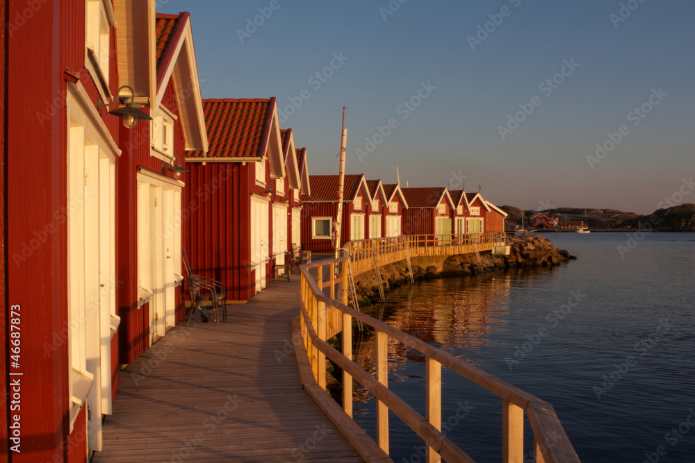 Fototapeta premium Swedish houses in Skärhamn at Sunset