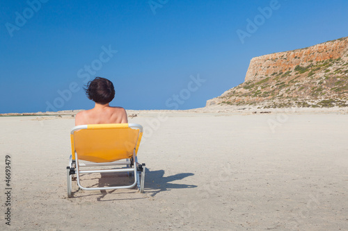 Woman alone on the beach 6