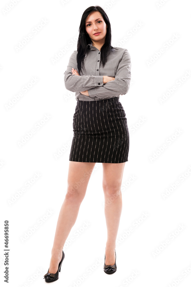 Fototapeta premium Beautiful businesswoman standing with crossed arms isolated on w