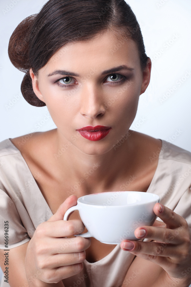 Woman in sweater with cup of aromatic coffee or tea Woman in sweater with cup of aromatic coffee or tea