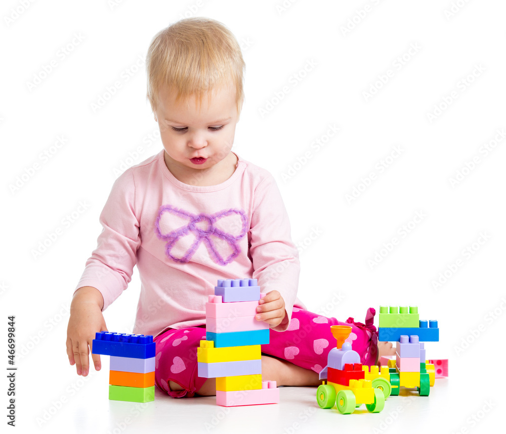 child playing with colourful toys. Isolated on white background child playing with colourful toys. Isolated on white background