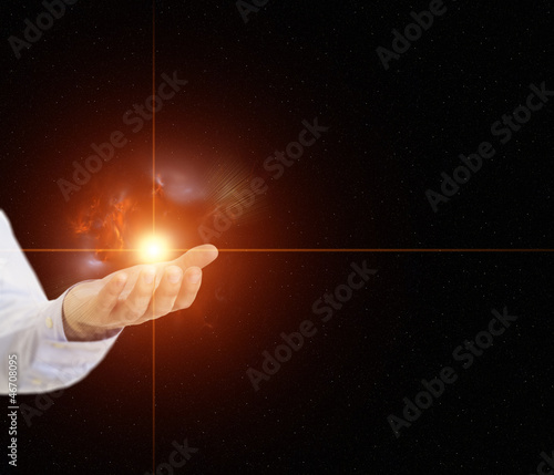 Open Hand holding a star with nebula