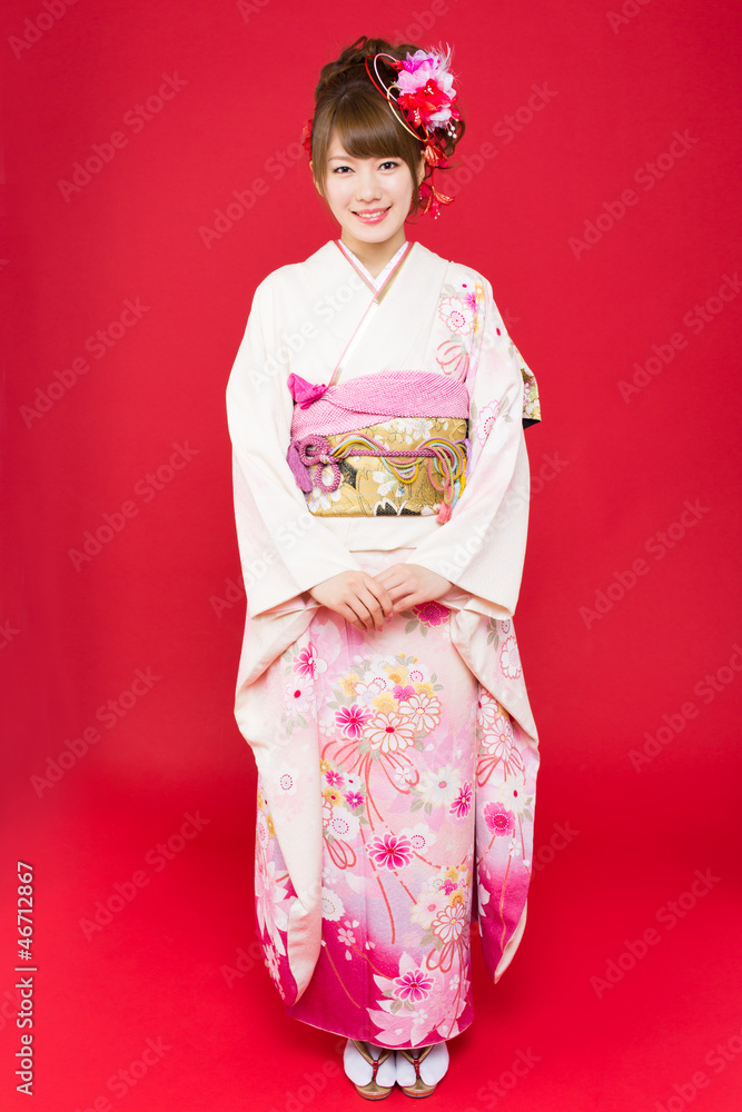 Beautiful japanese kimono woman on red background Beautiful japanese kimono woman on red background