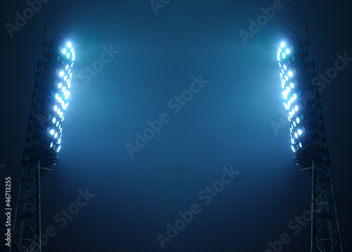 Stadium Lights against Dark Night Sky with Copy Space photo