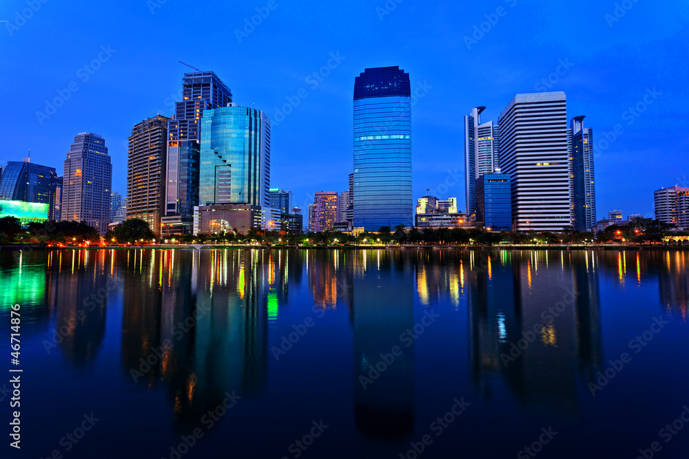 Fototapeta premium Bangkok in evening, reflection of buildings in water