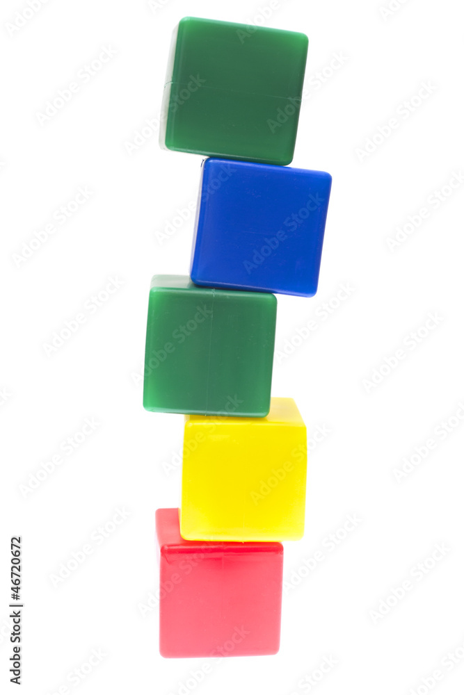 Children's pyramid from color cubes isolated on white background Children's pyramid from color cubes isolated on white background