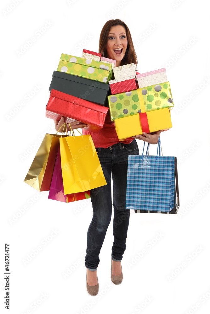 Happy woman with shopping bags and gifts