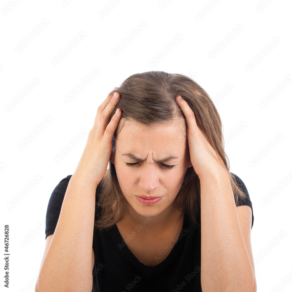 Young woman with headache holding her hand to the head Young woman with headache holding her hand to the head