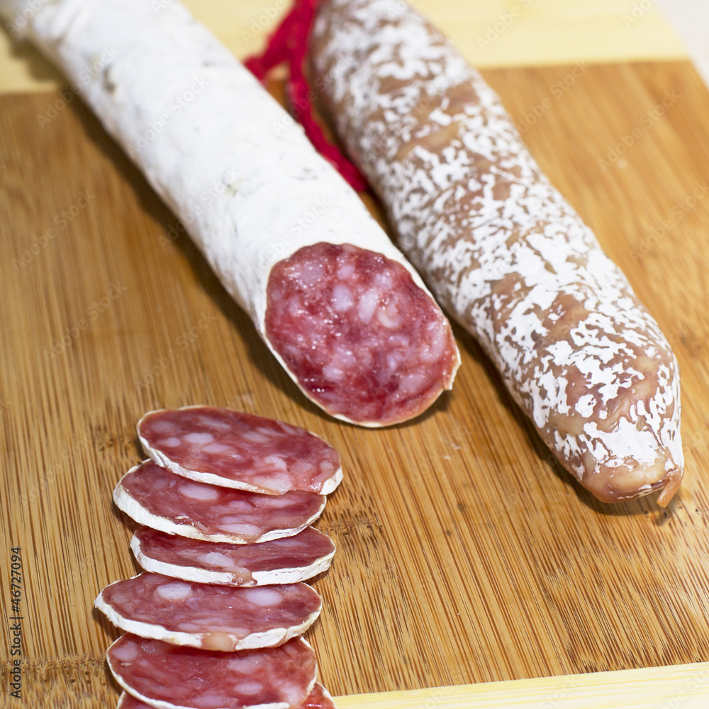 Culinary traditional spanish sausages on wooden background. Culinary traditional spanish sausages on wooden background.