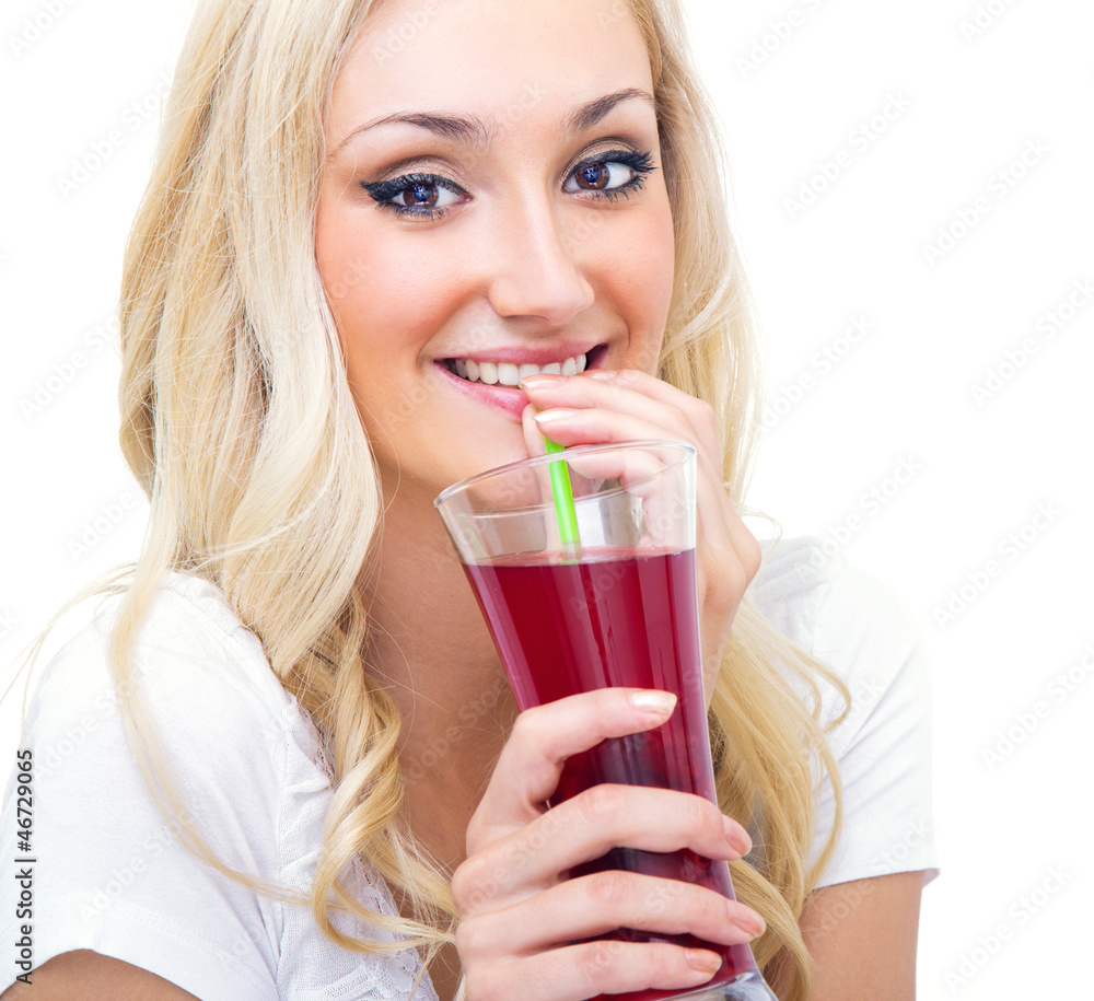 Young woman drinking lemonade, studio-shot Young woman drinking lemonade, studio-shot