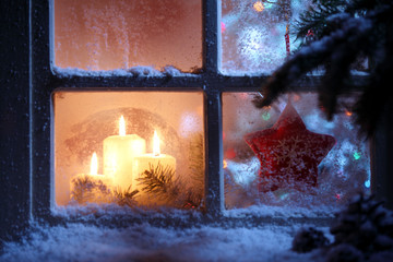 Frosted window with Christmas decoration