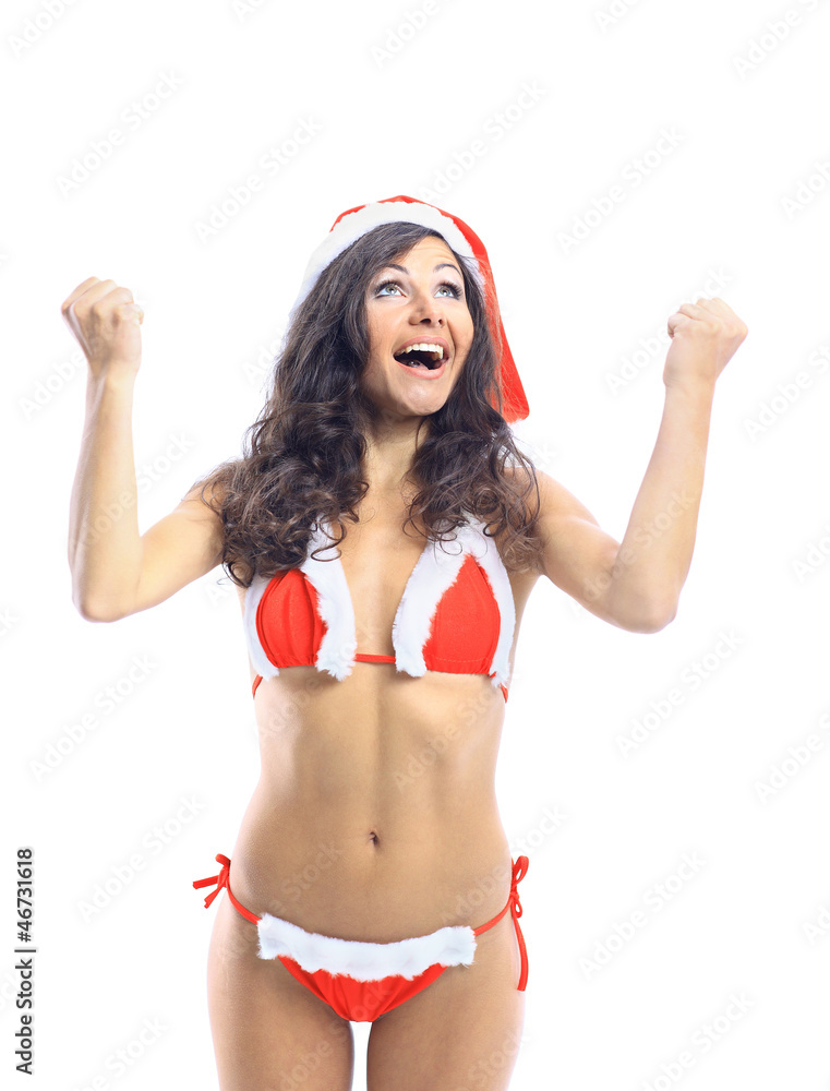 surprised christmas woman wearing a santa hat smiling isolated surprised christmas woman wearing a santa hat smiling isolated