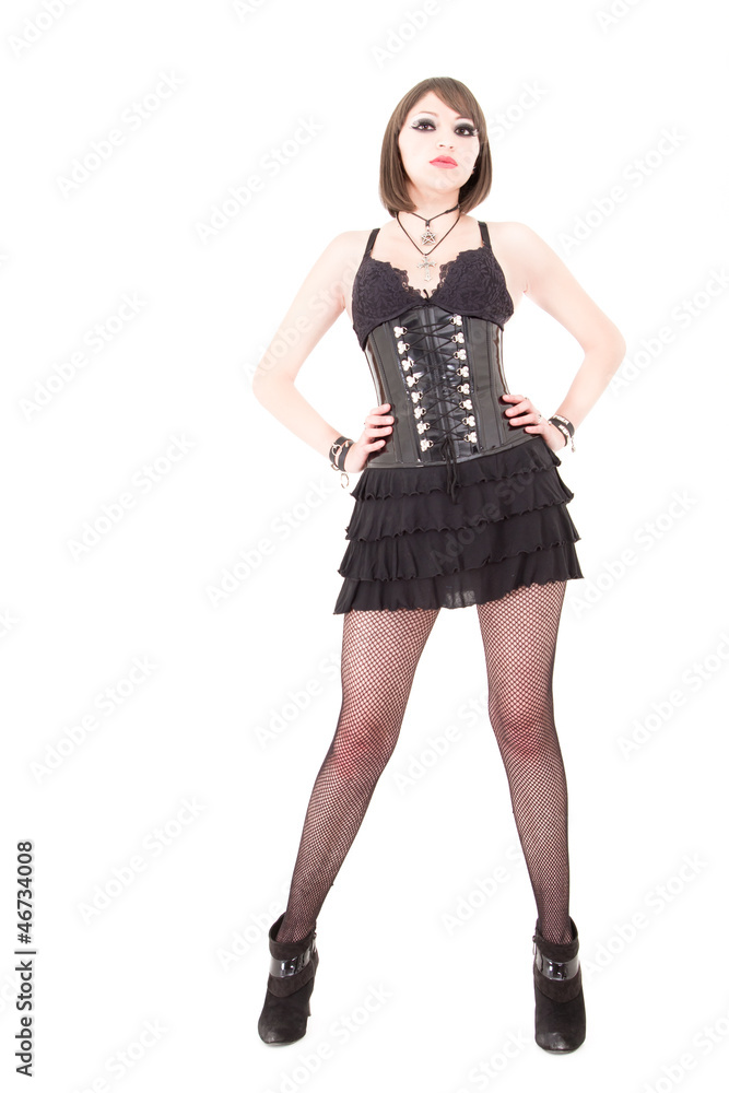 Young slim goth woman. white background. Young slim goth woman. white background.
