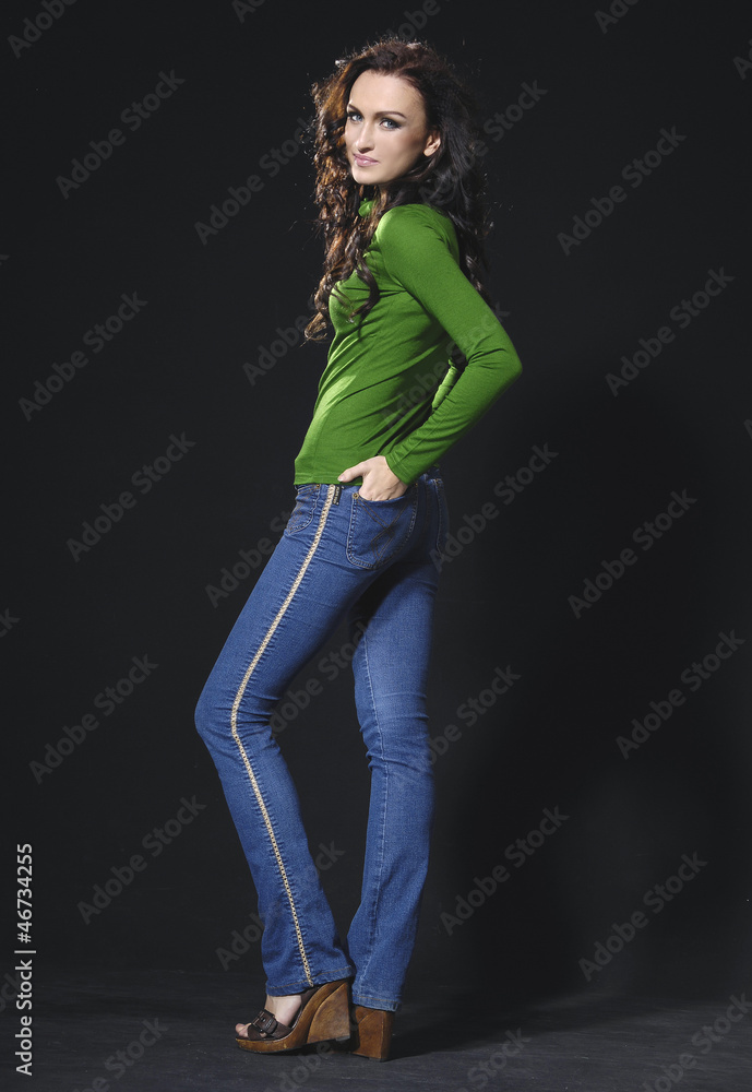 picture of Stylish woman in blue jeans posing picture of Stylish woman in blue jeans posing