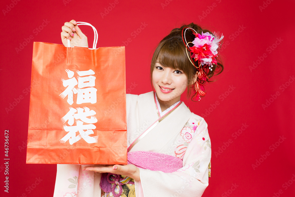 Beautiful japanese kimono woman on red background Beautiful japanese kimono woman on red background
