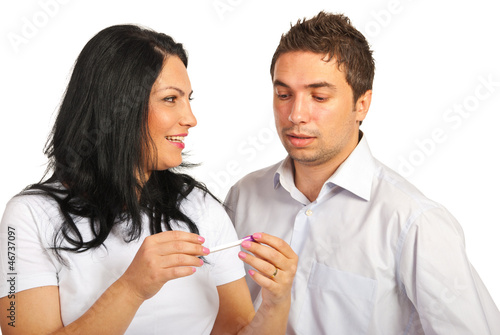 Couple holding pregnancy test