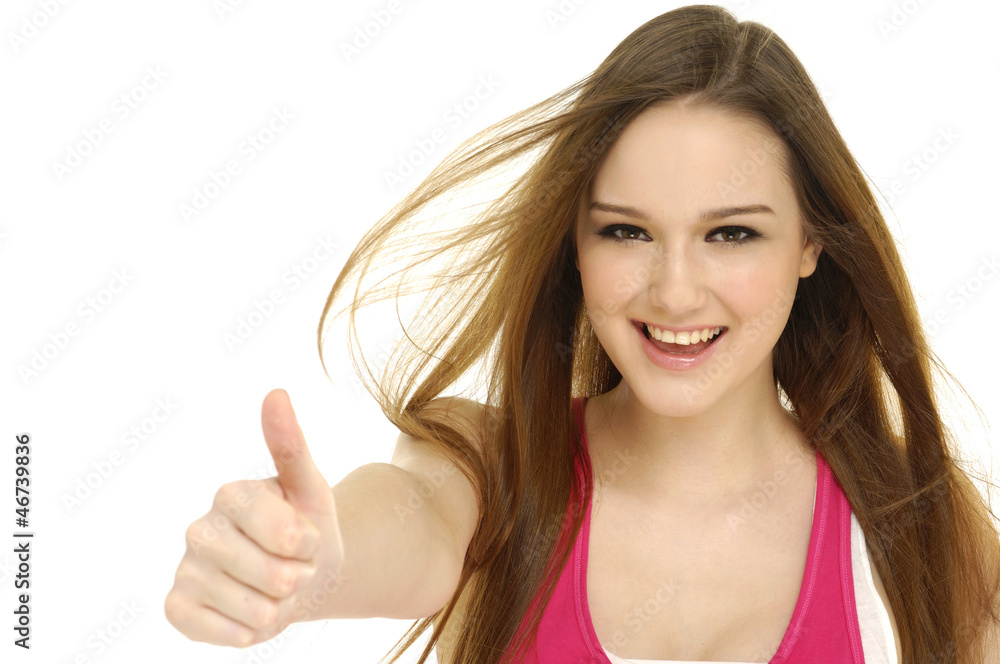 portrait of a happy young lady showing thumb's up sign portrait of a happy young lady showing thumb's up sign
