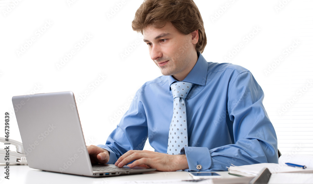 handsome business man using laptop computer handsome business man using laptop computer