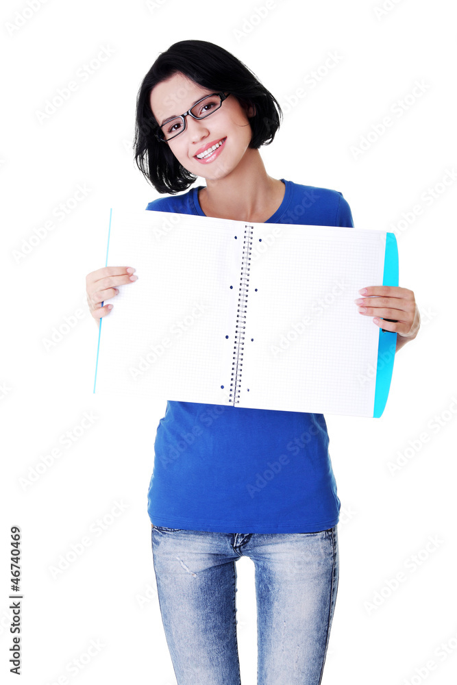 Young woman showing blank pages of her notebook Young woman showing blank pages of her notebook