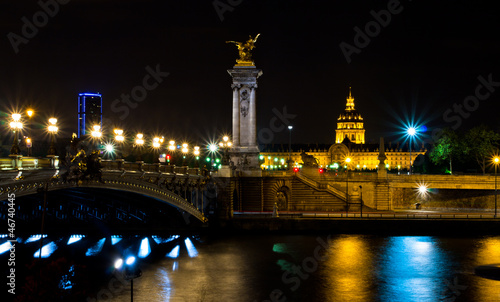 The Alexander III bridge and the dome of the Invalides at night