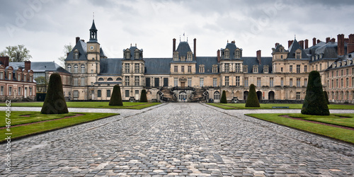 Entrance to the Chateau de Fontainebleau on a rainy day, France