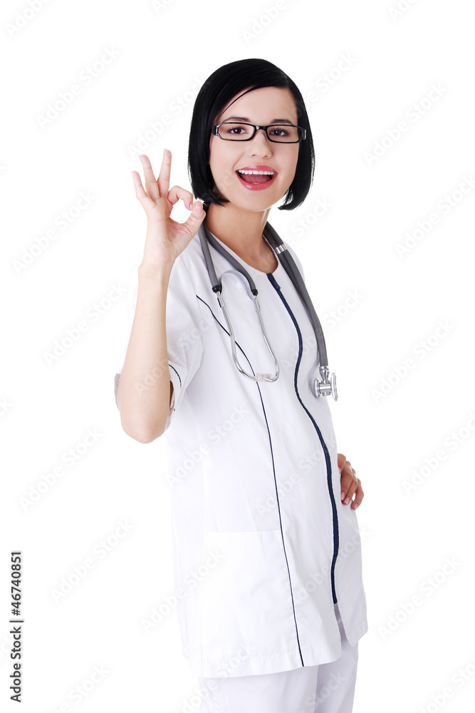 Young female doctor or nurse gesturing perfect Young female doctor or nurse gesturing perfect
