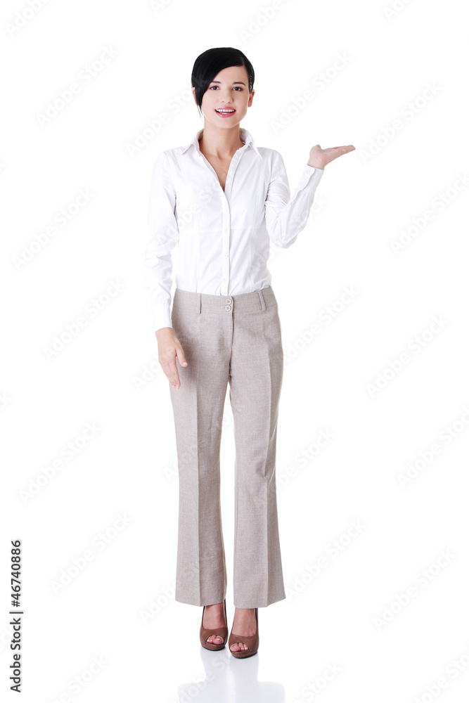 Happy businesswoman showing copy space Happy businesswoman showing copy space