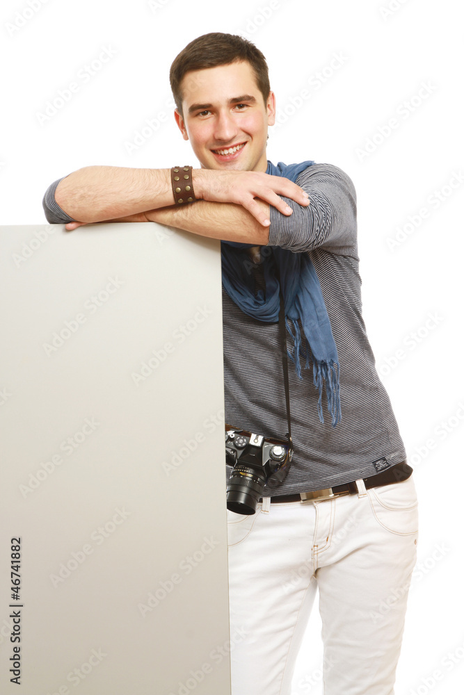 Naklejka premium Smiling photographer with his hands resting