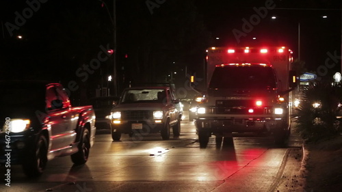 Ambulance breaking through in traffic