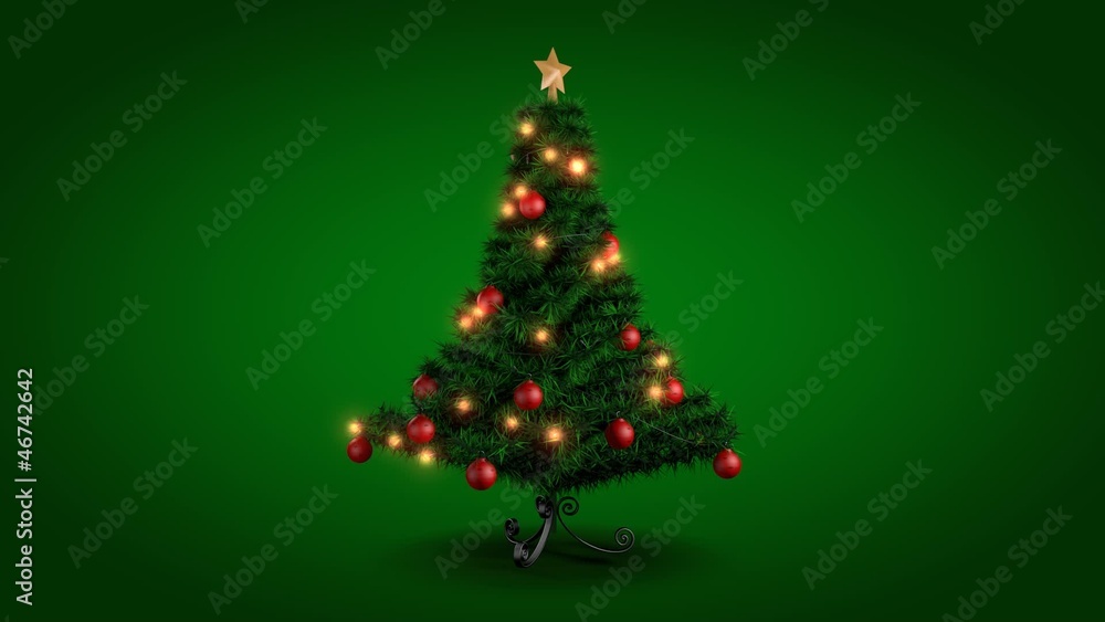 Rotating Christmas tree over green background Rotating Christmas tree over green background