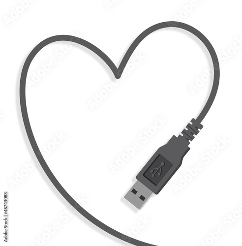 Câble USB gris formant un coeur