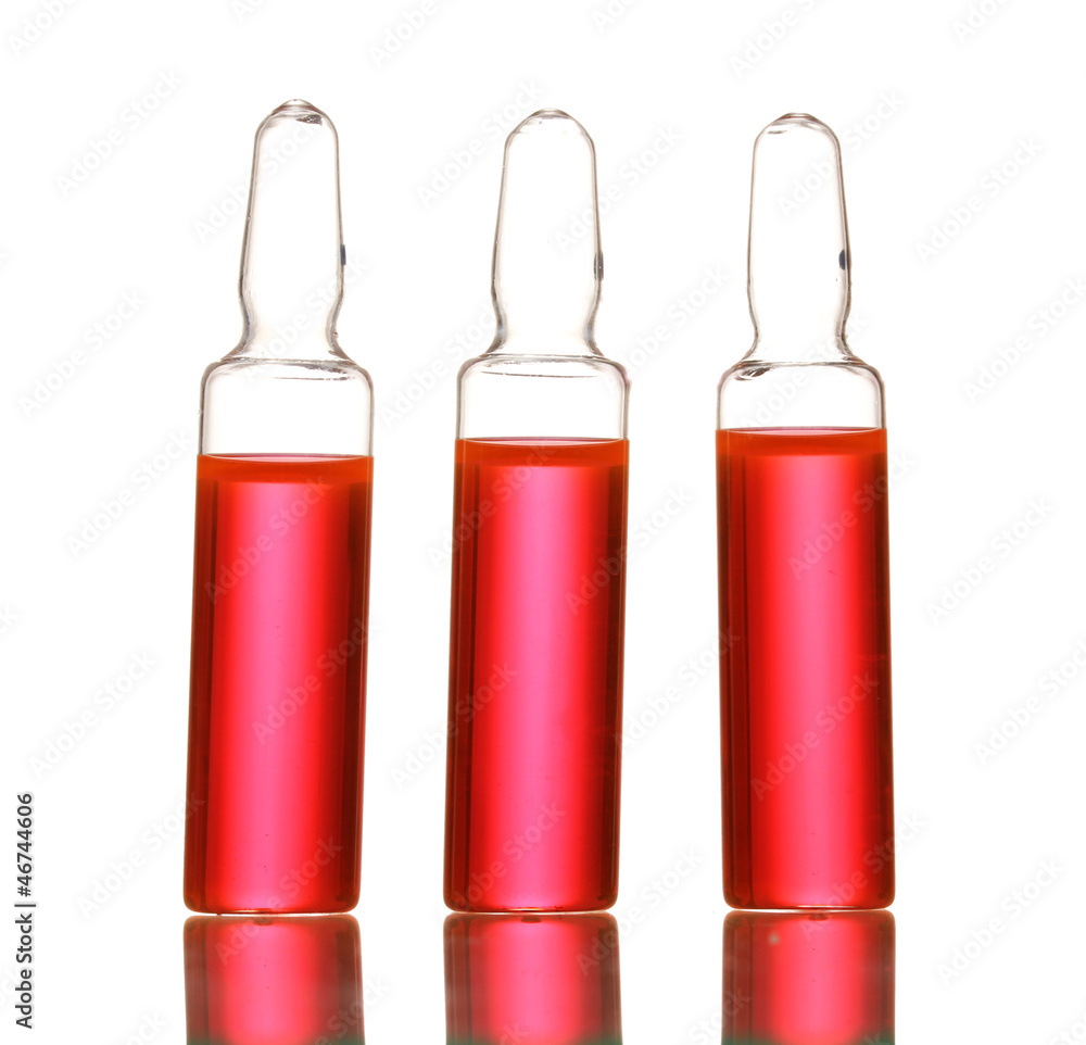 medical ampules with red liquid, isolated on white medical ampules with red liquid, isolated on white