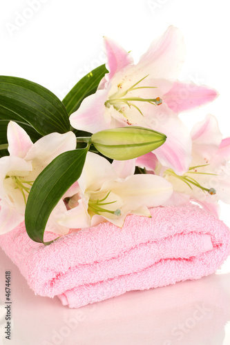 beautiful lily on towel isolated on white