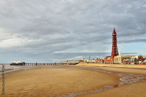 Blackpool Tower and pier, viewed across the sands.
