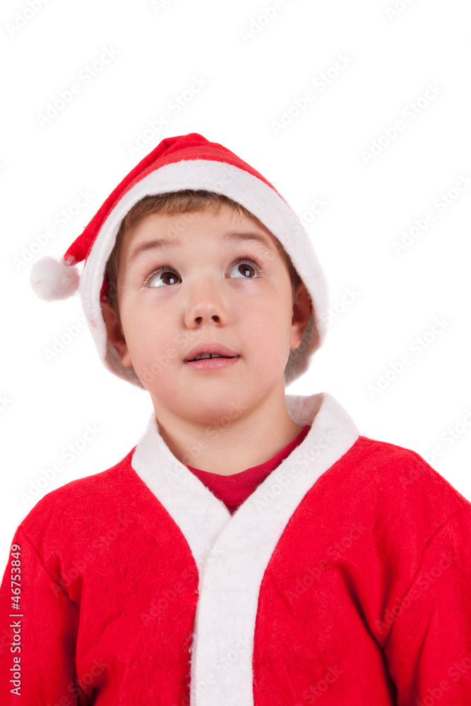happy little boy in Santa hat isolated on white background happy little boy in Santa hat isolated on white background