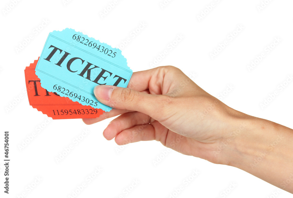 Woman's hand holding a colorful tickets Woman's hand holding a colorful tickets